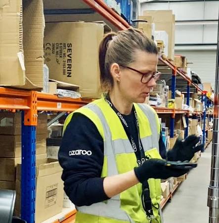 An Ozaroo team member working in the distribution centre